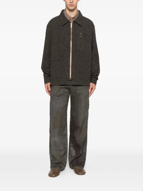 A Tentative Atelier jacket with zip fastening